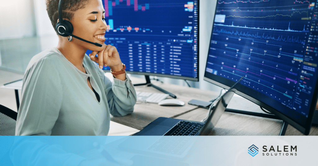 a woman working at a computer.