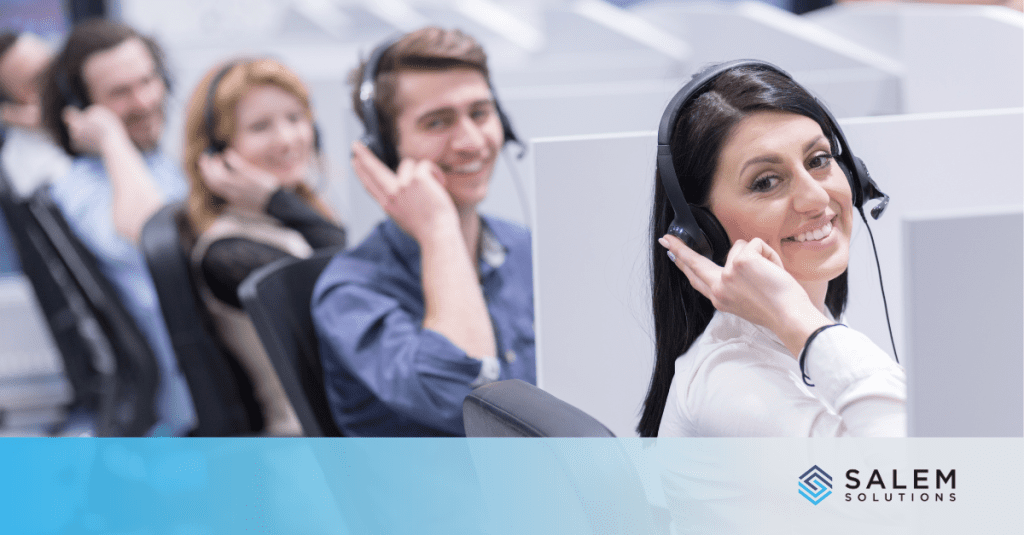 A group of call center agents with headsets smiling confidently, representing travel industry seasonal call center staffing as they assist travel and hospitality customers during peak season