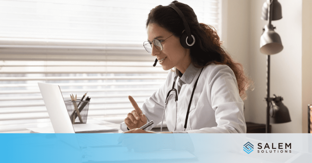 Healthcare call center agent with headset working on compliance training at computer workstation