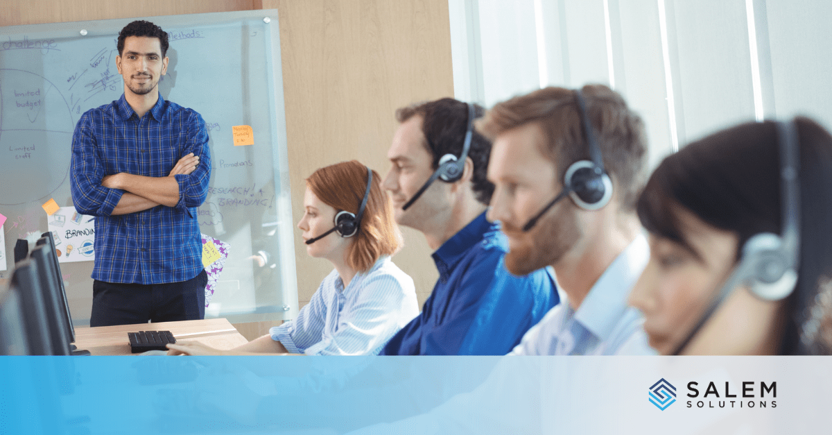 Manager leading call center team with headsets demonstrating Q4 federal assignment support roles.