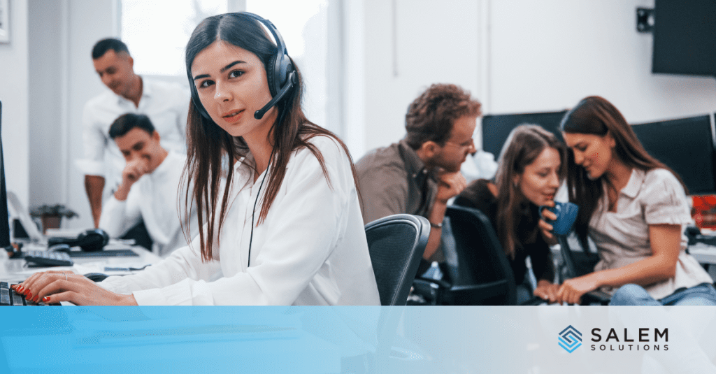 Customer service representative with headset in call center for federal enrollment support.