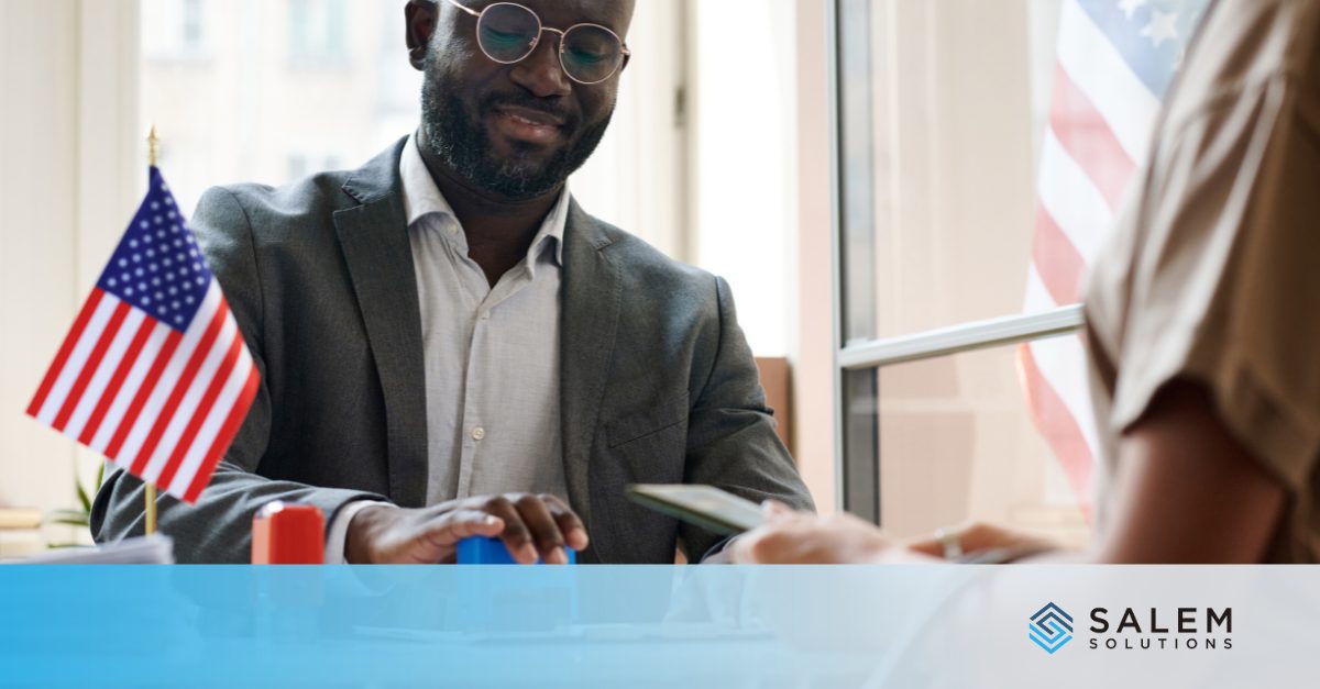 Professional in business meeting with American flag representing mission-aligned teams in federal contracting workforce.